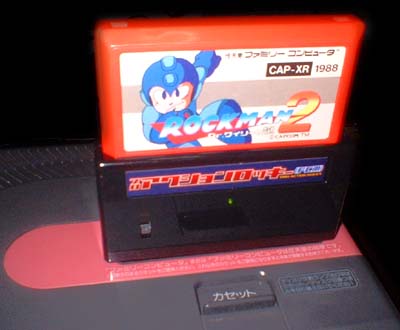 Rockman 2 works great! And no fucked-up music like with the Game Genie!